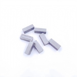 Round tungsten carbide button tips for oil-field drilling